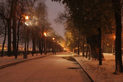 View of illuminated street at night