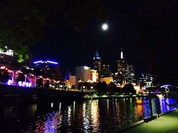 Illuminated cityscape at night