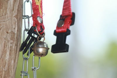 Close-up of metal chain against wall