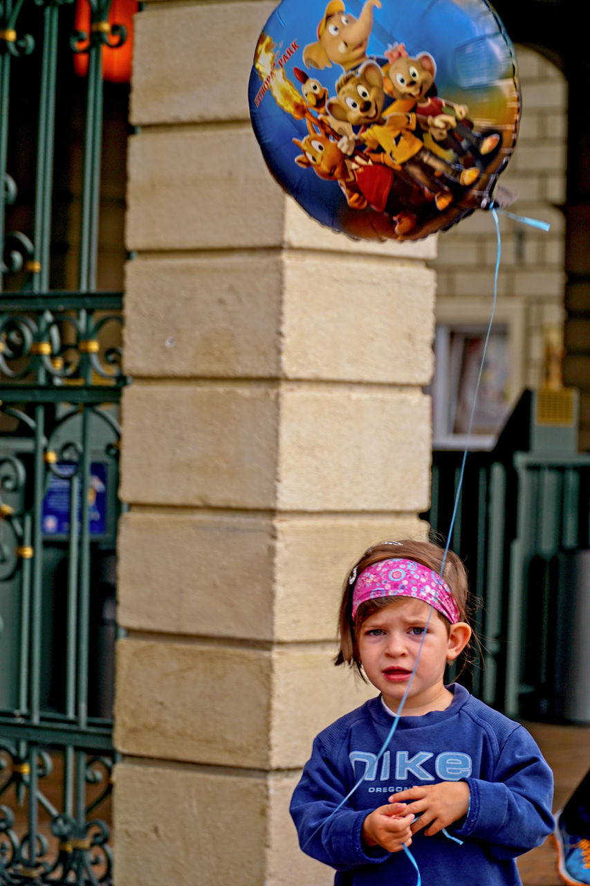 childhood, real people, building exterior, architecture, built structure, boys, one person, cap, day, outdoors, cute, lifestyles, multi colored, portrait