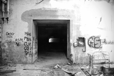 Graffiti on wall in abandoned building