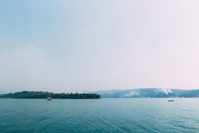 Scenic view of sea against clear sky