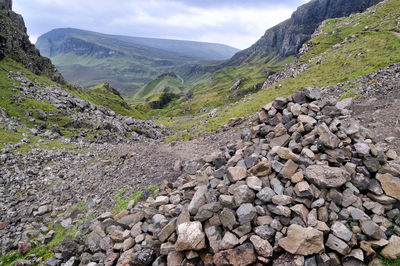 Rocks on land against sky