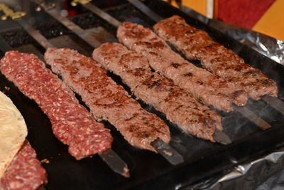 Close-up of grilled meat on barbeque