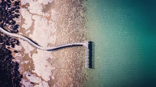 Aerial view of jetty at beach