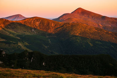 Scenic view of mountains during sunset