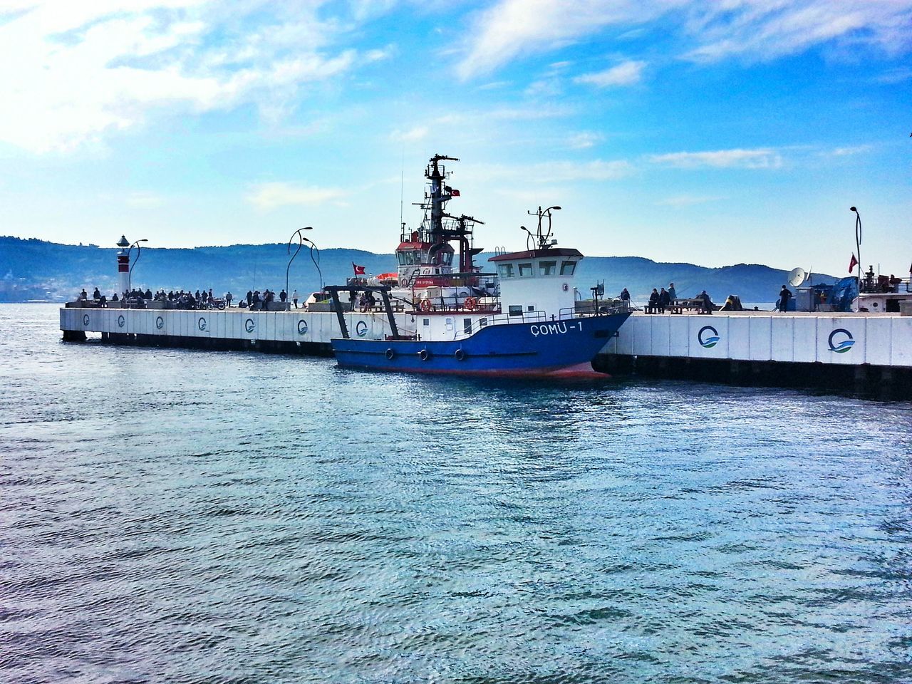 nautical vessel, transportation, water, mode of transport, sea, waterfront, sky, boat, harbor, mast, moored, cloud - sky, ship, sailboat, commercial dock, rippled, nature, cloud, travel, tranquility