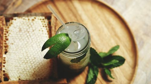 High angle view of mojito in glass on table