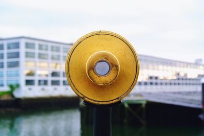 Close-up of telescope against sky