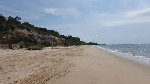 Scenic view of beach against sky