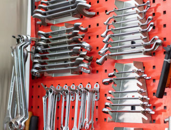 Close-up of work tools on workbench at workshop