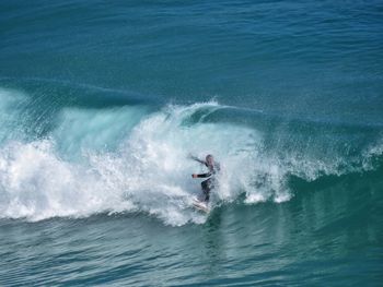 Man surfing in sea