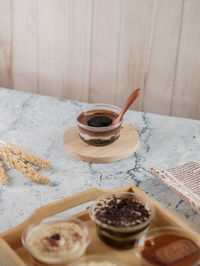 High angle view of chocolate dessert cup on table