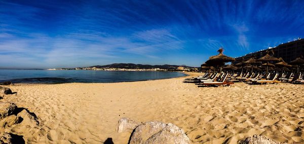 Scenic view of beach against sky