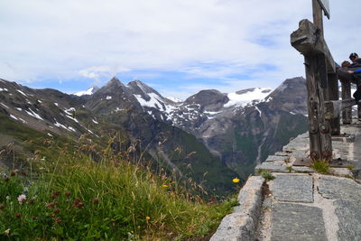 Scenic view of mountains against cloudy sky