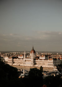 High angle view of buildings in city against sky