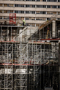 Scaffolding in front of a building under construction