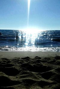 Sun shining over sea