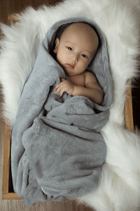 Portrait of cute baby relaxing at home