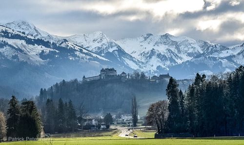 Scenic view of snowcapped mountains against sky