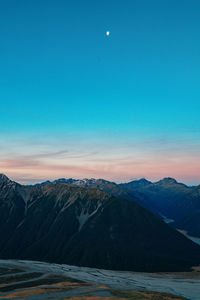 View of mountains against blue sky