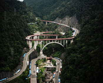 High angle view of road amidst trees