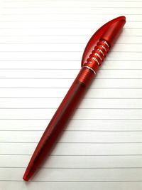 Close-up of pen on table