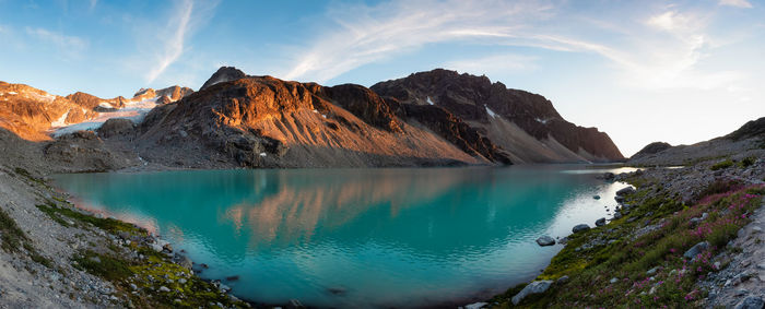 Panoramic view of lake and mountains against sky