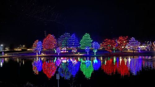 Illuminated buildings in city at night