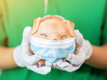 Portrait of baby girl wearing mask