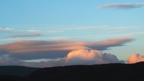 Scenic view of mountains against sky during sunset