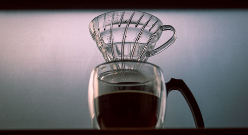 Close-up of coffee cup on table