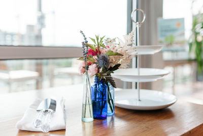 Close-up of flower vase on table
