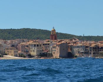 Scenic view of sea against clear blue sky