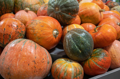 Close-up of pumpkins for sale at market stall