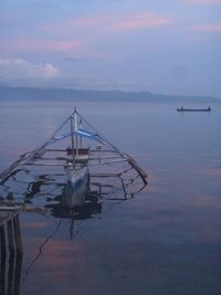 Scenic view of sea against sky at sunset