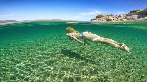 Man swimming in sea