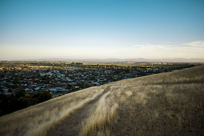 Aerial view of cityscape against clear sky