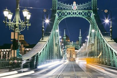 Light trails on bridge at night