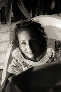 Portrait of young woman in bathtub