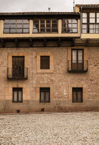 Facade of medieval building in siguenza, castilla la mancha, spain