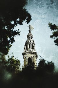 Low angle view of statue against sky