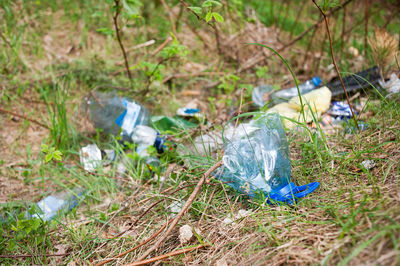 Close-up of garbage on grass