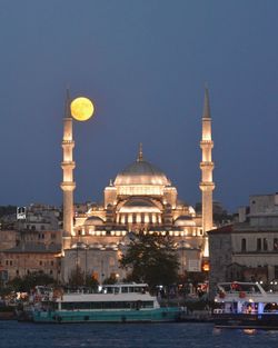 Low angle view of mosque against clear sky