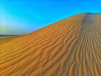 Sand dunes waves in desert of algeria