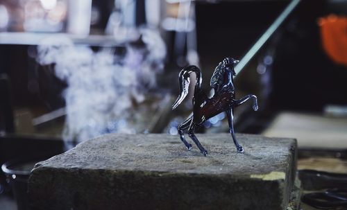 Close-up of animal metallic statue