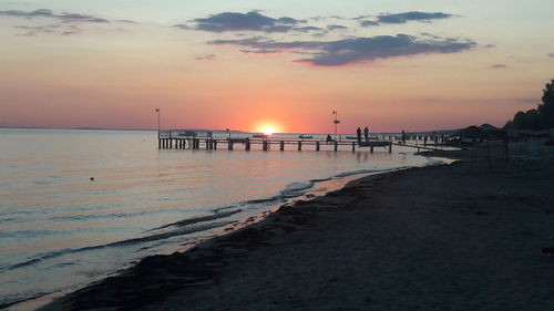 Scenic view of beach during sunset