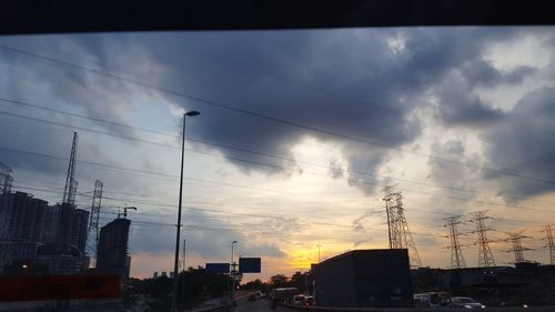 Silhouette of city at sunset