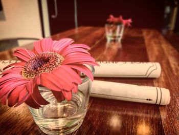 Close-up of pink flowers on table