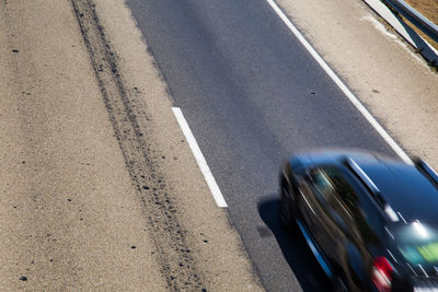 Blurred motion of vehicles on road